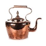 A COPPER KETTLE, LATE 19TH CENTURY with fixed handle, swan-neck spout, the cover with acorn finial