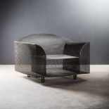 A 'HOW HIGH THE MOON' ARMCHAIR DESIGNED IN 1986 BY SHI-RO KURAMATA FOR VITRA nickel-plated mesh,