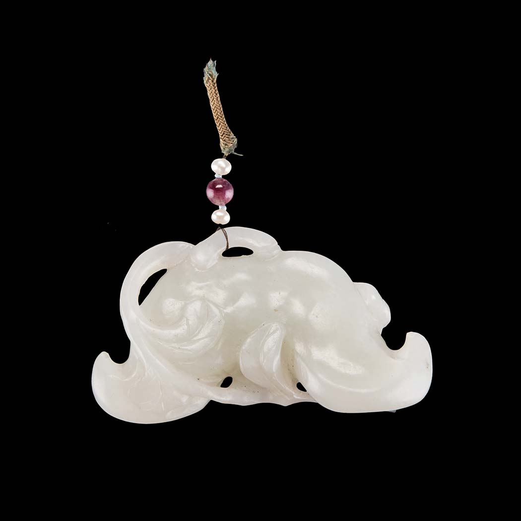 A CHINESE WHITE JADE TOGGLE OF A LÍNGJIĂO, QING DYNASTY, EARLY 18TH/LATE 19TH CENTURY the horn-