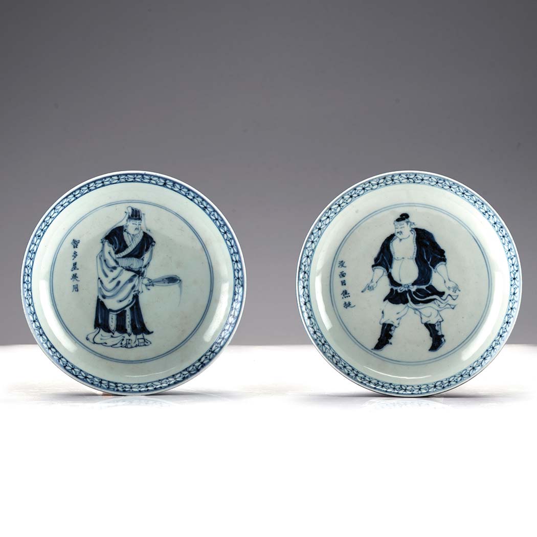 A PAIR OF CHINESE BLUE AND WHITE SAUCER DISHES, QING DYNASTY, 19TH CENTURY each decorated to the