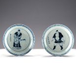 A PAIR OF CHINESE BLUE AND WHITE SAUCER DISHES, QING DYNASTY, 19TH CENTURY each decorated to the