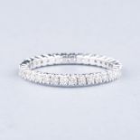 AN 18K WHITE GOLD CLAW-SET FULL ETERNITY RING the diamonds weighing approximately 1ct in total
