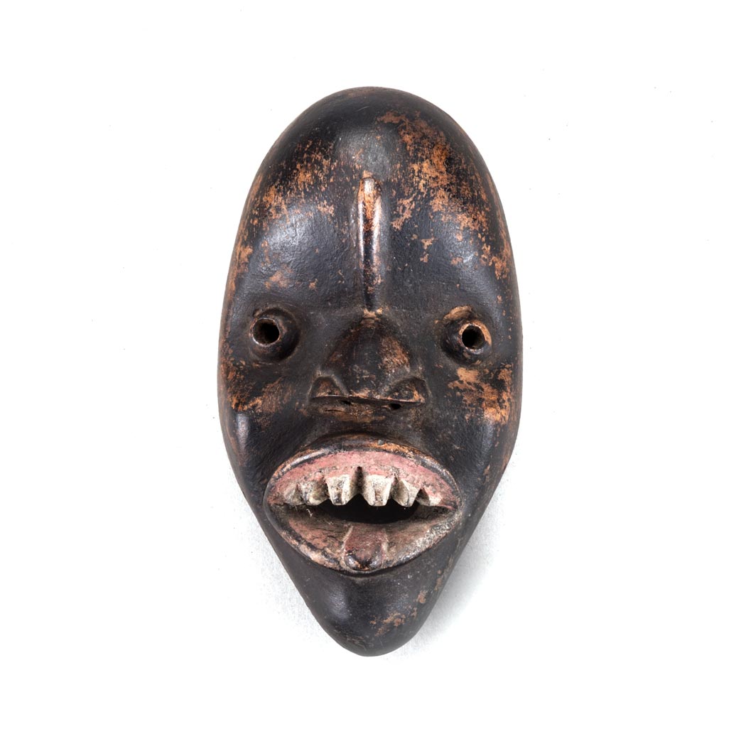 A DAN BUGLE MASK, LIBERIA Height: 27cm PROVENANCE Purchased in the United Kingdom in the 1960's