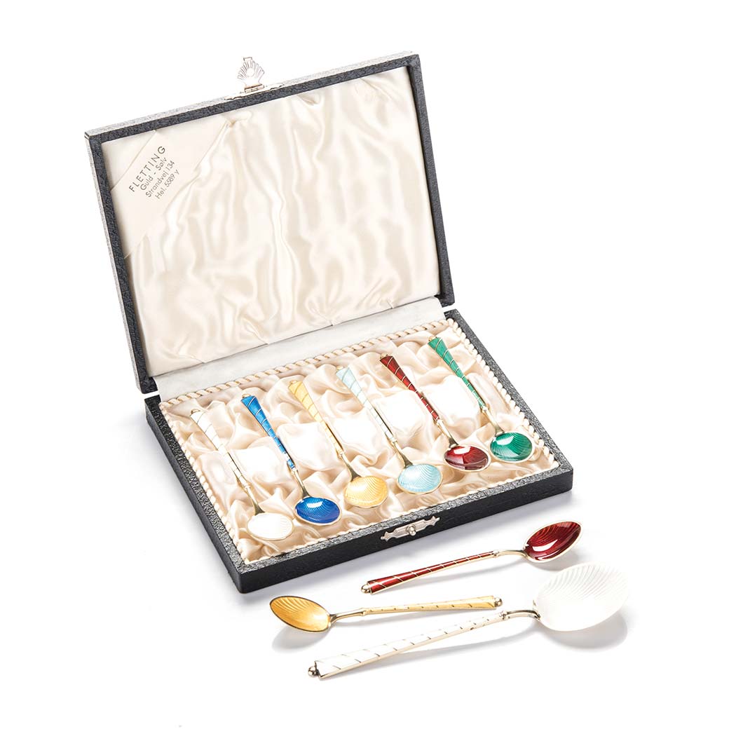 A SET OF EIGHT DANISH ENAMELLED SILVER-GILT CASED SPOONS various coloured enamels, and Another,