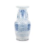 A CHINESE BLUE AND WHITE VASE, LATE 19TH CENTURY the tapering baluster body with everted rim,