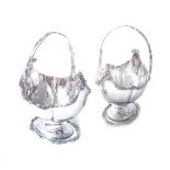 A PAIR OF GEORGE V SILVER BASKETS, GEORGE JENKINS & JAMES GREEN, LONDON, 1913 shaped oval, the rim