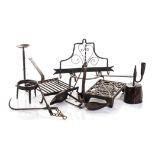 A MISCELLANEOUS GROUP OF WROUGHT IRON ITEMS, 19TH CENTURY comprising: four trivets (in various