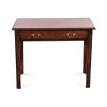 A GEORGE III MAHOGANY TABLE the moulded rectangular top above a long frieze drawer on square section