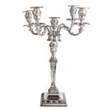 A VICTORIAN SILVER CANDELABRA, INDECIPHERABLE MAKER’S MARK, LONDON, 1899 the square foot with beaded