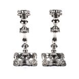 A PAIR OF EDWARDIAN SILVER CANDLESTICKS, THOMAN BRADBURY & SONS, SHEFFIELD, 1909 the knopped