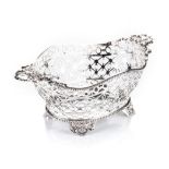 AN EDWARDIAN SILVER BASKET, WILLIAM COMYNS, LONDON, 1909 of oval form, the whole pierced with