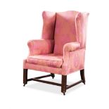 A GEORGE III UPHOLSTERED WINGBACK ARMCHAIR PROVENANCE PROVENANCE The Craig Troeberg Collection