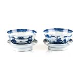 A NEAR PAIR OF CHINESE BLUE AND WHITE BOWLS each interior painted with a mountainous landscape