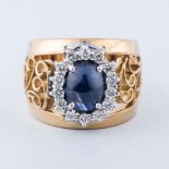 A SAPPHIRE AND DIAMOND RING the 2.40ct oval cabochon sapphire is set with 14 round brilliant cut