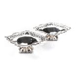A PAIR OF EDWARDIAN SILVER BASKETS, ALBERT HENRY THOMPSON, SHEFFIELD, 1904 shaped square with
