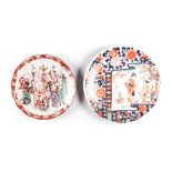 A JAPANESE IMARI CHARGER, MEIJI, 1868 - 1912 depicting maidens at various pursuits amongst blossom