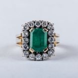 AN EMERALD AND DIAMOND RING 16 round brilliant cut diamonds weighing approximately 1ct in total