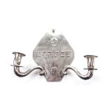 AN ELECTROPLATE SHABBAT TWO-LIGHT WALL SCONCE, 20TH CENTURY the shaped rectangular backplate moulded