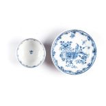 A CHINESE BLUE AND WHITE CUP AND PLATE the cup interior painted with a fine floral border, the