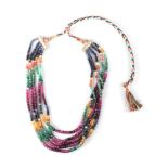 A RUBY, SAPPHIRE AND EMERALD NECKPIECE comprising five strands of facetted ruby, sapphire and