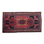 A HAMADAN RUG, IRAN, MODERN condition : fair, minor wear, repair 236 by 126cm