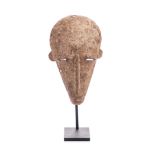 A MALE IRON MASK, BAMBARA forged, used in night funeral ceremonies 23,5cm high