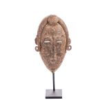 A FEMALE IRON MASK, BAMBARA forged, used in night funeral ceremonies 24cm high