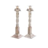 A PAIR OF BRASS ALTAR CANDLE HOLDERS, 20th CENTURY each square base with beaded border, moulded with