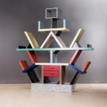 A CARLTON ROOM DIVIDER DESIGNED IN 1981 BY ETTORE SOTTSASS FOR MEMPHIS of geometric design, the