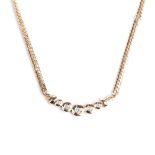 A DIAMOND NECKPIECE the 5 diamonds tube-set in a row and suspended by ﬂat snake chain in 9k yellow