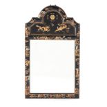 A CHINESE-STYLE GILT LACQUERED MIRROR the rectangular frame surmounted by a shaped pediment, centred