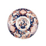 A JAPANESE IMARI CHARGER, MEIJI PERIOD, 1868 – 1912 the centre decorated with a chrysanthemum filled