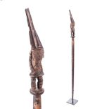 A CARVED STAFF WITH CHIKUNZA FINIAL, CHOKWE, ANGOLA/ZAIRE 100cm long PROVENANCE Michael Heuermann,