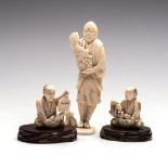 A JAPANESE IVORY OKIMONO OF A FARMER, MID 20TH CENTURY NOT SUITABLE FOR EXPORT standing, dressed