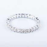 A FULL DIAMOND ETERNITY RING the diamonds weighing approximately 1ct in total
