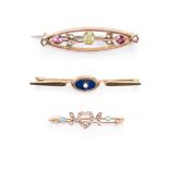 A TRIO OF BROOCHES comprising: an Antique gold, blue enamel and seed pearl bar brooch, a Victorian