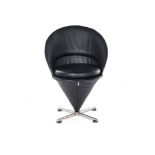 A LEATHER UPHOLSTERED CONE CHAIR DESIGNED IN 1958 BY VERNER PANTON the shaped backrest above a
