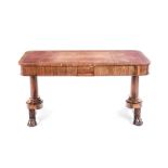 A WILLIAM IV MAHOGANY WRITING TABLE the rounded rectangular top with a gilt-tooled leather inset