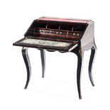 AN EBONISED INLAID AND GILT-METAL MOUNTED BUREAU, 19TH CENTURY the rectangular velvet lined top