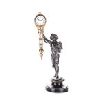 A FIGURAL STANDING TIMEPIECE, 20TH CENTURY BUYERS ARE ADVISED THAT A SERVICE IS RECOMMENDED FOR