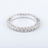 AN 18K FULL ETERNITY RING the claw set full diamond eternity ring, of typical form, colour G/H,