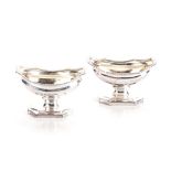 A NEAR PAIR OF ENGLISH SILVER SALTS, ABSTINANDO KING, LONDON,1804/1813 with gadrooned borders and
