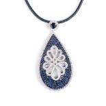 A SAPPHIRE AND DIAMOND PENDANT the tear shaped pendant is pavé-set with 6.82ct of natural round