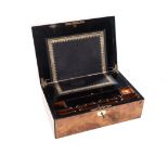 A VICTORIAN WALNUT TRAVELLING WRITING DESK the hinged rectangular top centred by a shield-shaped