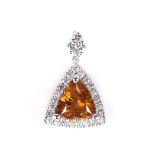 AN 18K WHITE GOLD AND TRILLIANT CUT DIAMOND PENDANT the 4.60ct natural, fancy deep brownish
