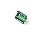 A 45.70CT TOURMALINE the emerald cut tourmaline is deep green in colour