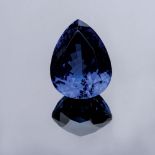 A 103.40CT TANZANITE the modified brilliant pear cut tanzanite is violet-blue and accompanied by