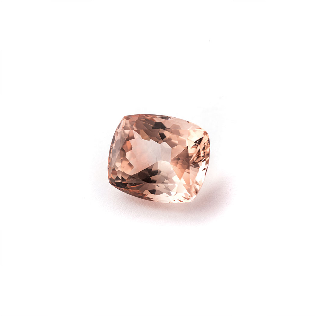 A 12.50CT TOURMALINE the modified brilliant cushion cut tourmaline is peach in colour and