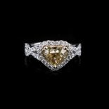 A HEART SHAPE DIAMOND RING the central modified brilliant heart shaped diamond weighing 1,61cts,