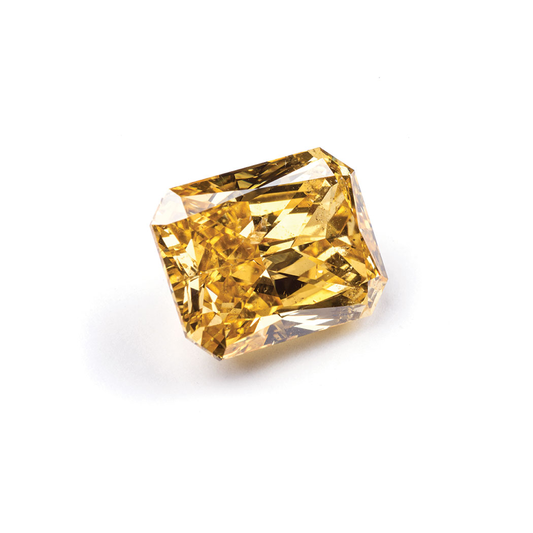 A FANCY VIVID ORANGY YELLOW DIAMOND the 8.37ct modified brilliant cut-cornered rectangular cut,